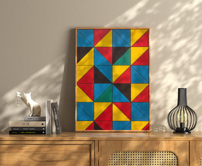 Colorful geometric abstract painting on a wall above a wooden cabinet with decorative items.