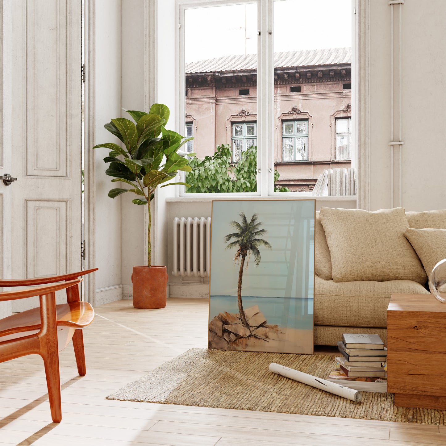 A cozy living room with a couch, plants, and a framed palm tree picture.