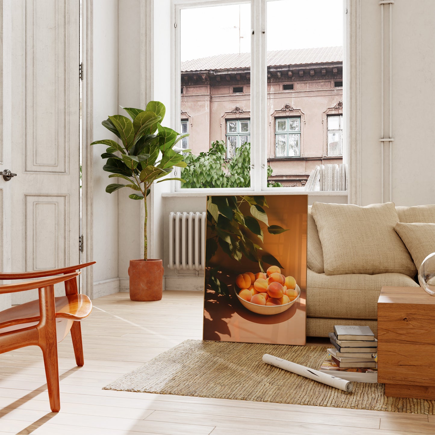 A cozy living room with a sofa, wooden table, large plant, and a painting of peaches by a sunny window.