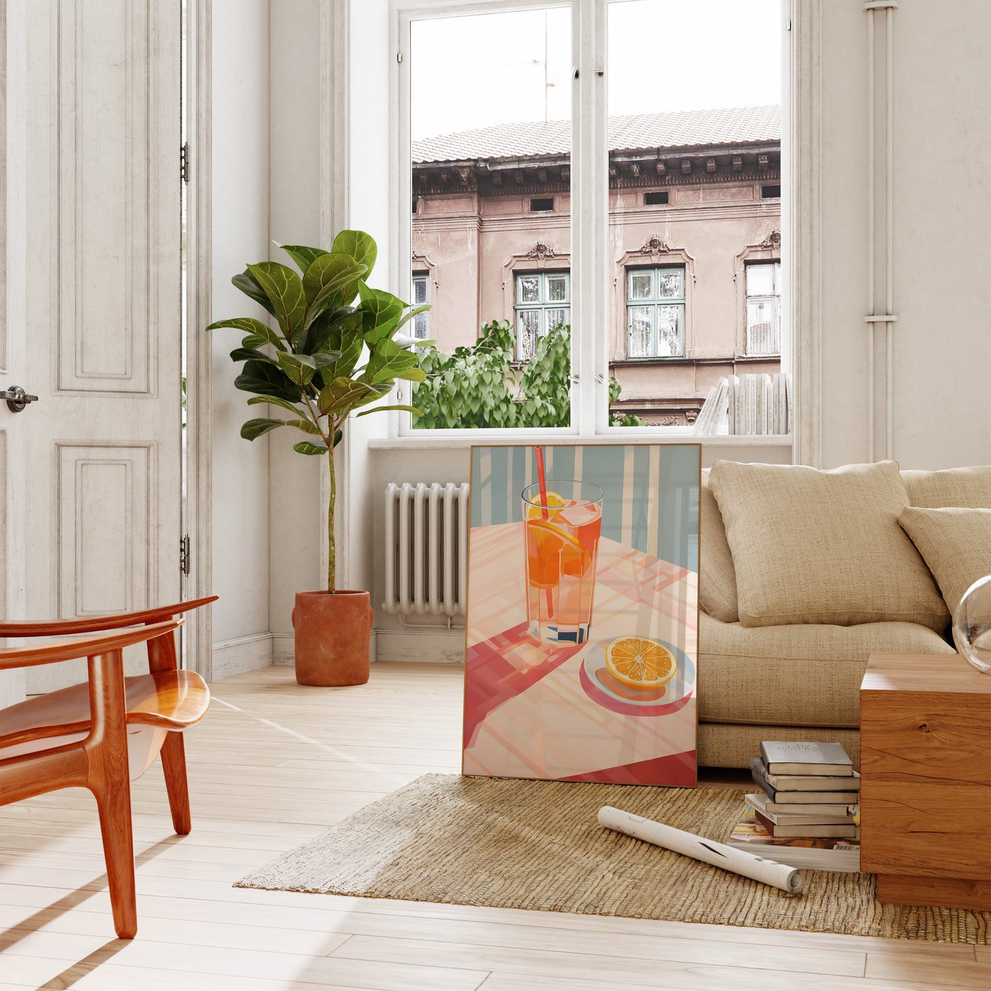A bright living room with a plant, furniture, and a canvas print of a cocktail.