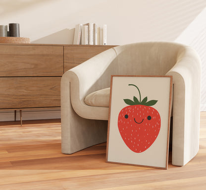 Curved armchair beside a wooden cabinet with a framed strawberry print leaning against it.
