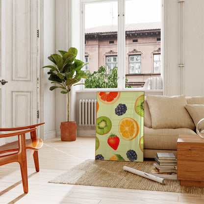 Bright living room with a colorful fruit-patterned cabinet and a large plant near the window.