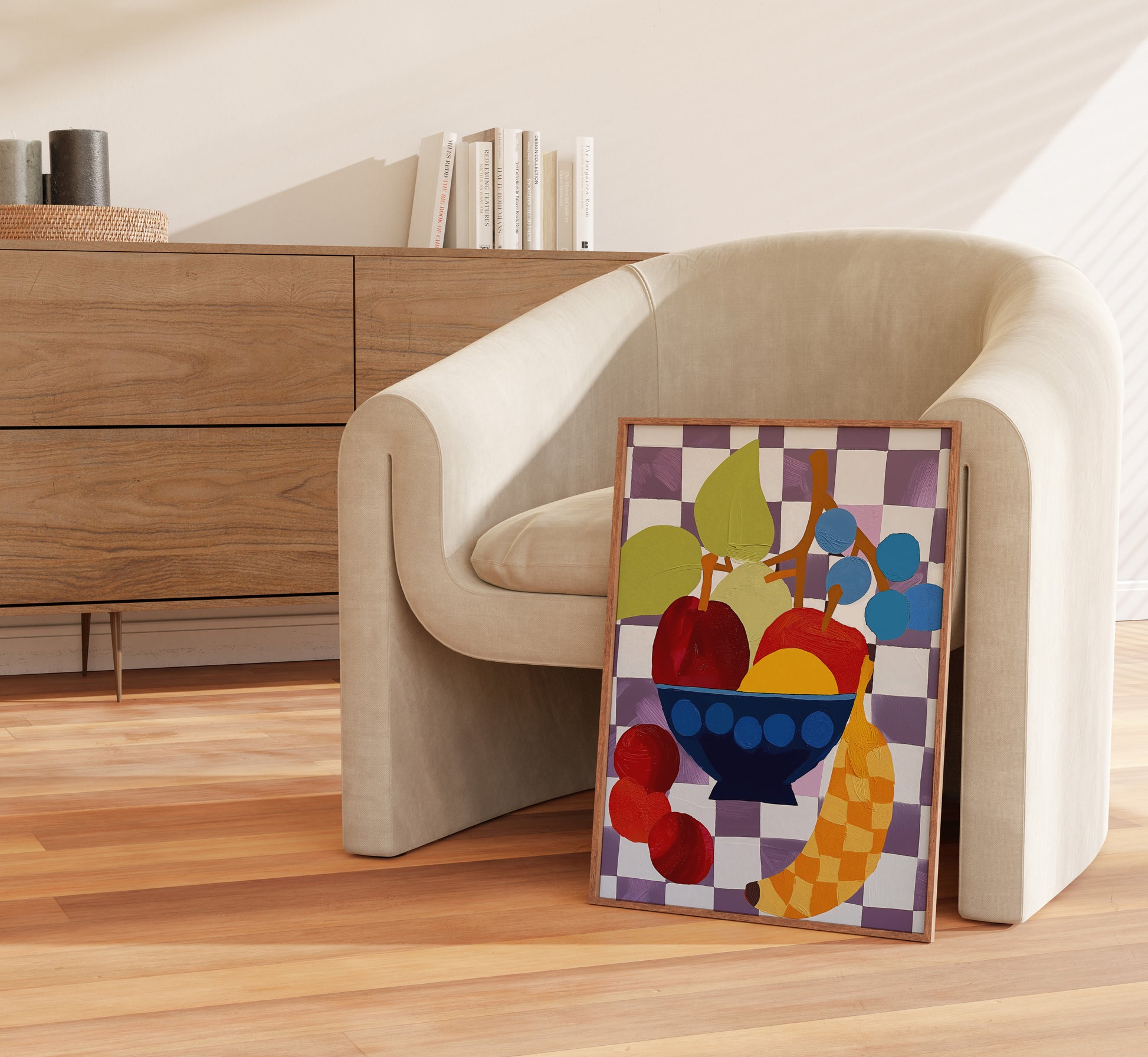 A modern armchair with a colorful abstract painting leaning against it in a stylish interior.