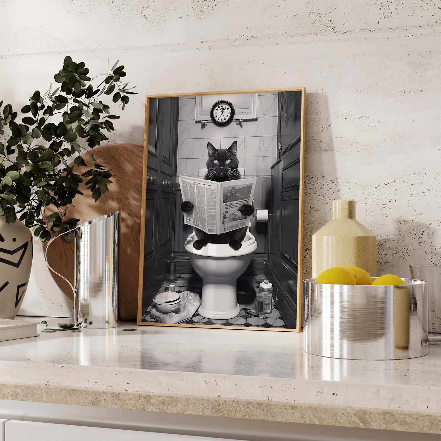 A whimsical framed picture of a cat reading a newspaper on a toilet.