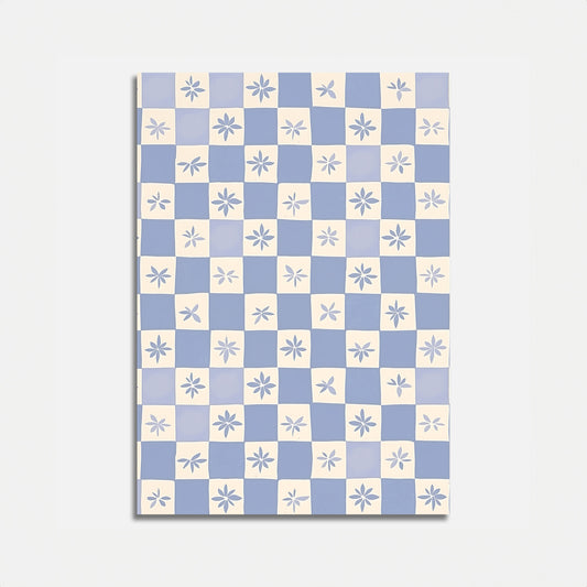A patterned canvas with blue and white checkers and floral motifs.
