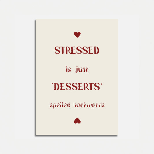Decorative poster with text "STRESSED is just 'DESSERTS' spelled backwards" and heart designs.