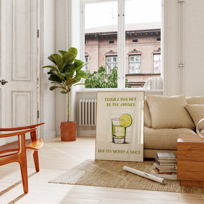 A cozy living room with a sofa, plants, and a fun poster about tequila.