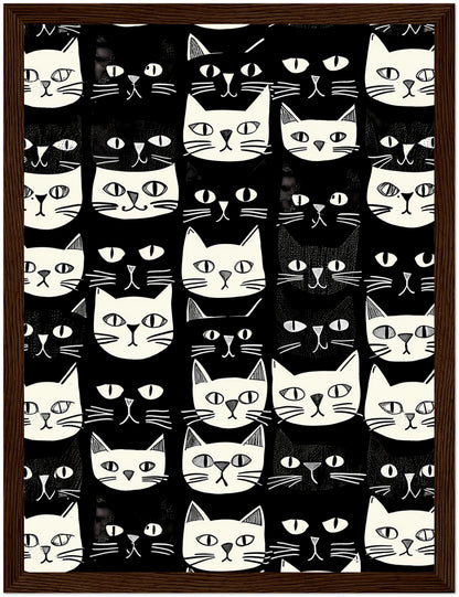 Black and white patterned artwork featuring various stylized cat faces.