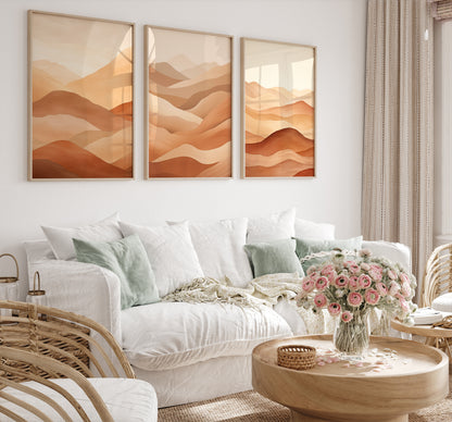 A cozy bedroom with a white bed, abstract wall art, and a bouquet of pink flowers on a wooden table.
