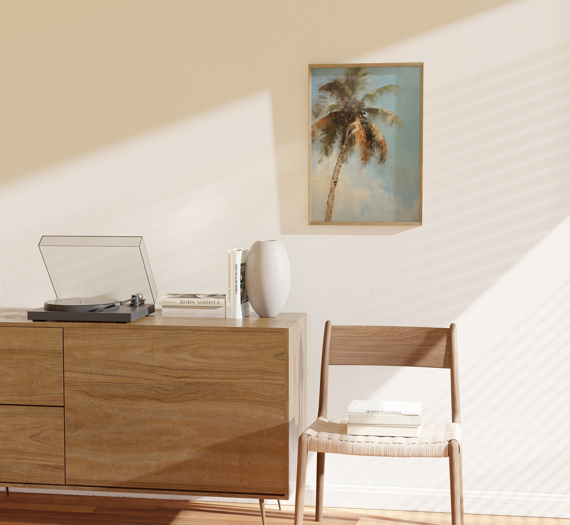 A cozy room with a record player on a wooden cabinet, a chair, and a framed palm tree painting on the wall.