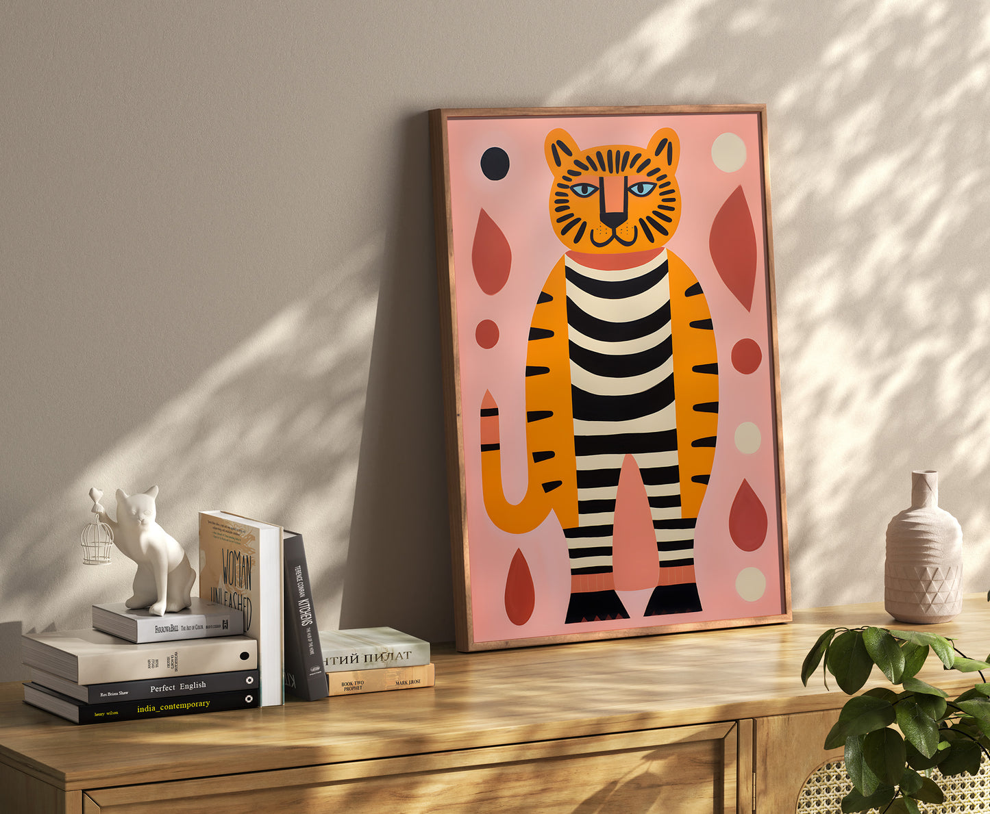 A colorful framed illustration of an abstract cat standing upright, displayed in a stylish room.