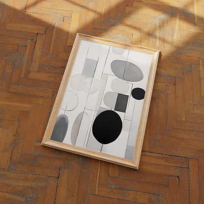 Abstract artwork with geometric shapes in a wooden frame on a herringbone floor.