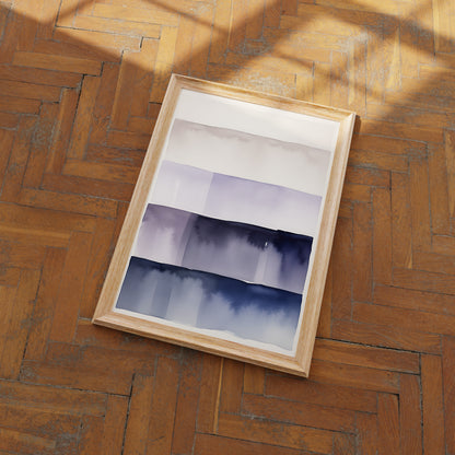 A framed abstract painting with gradient stripes on a herringbone wood floor.