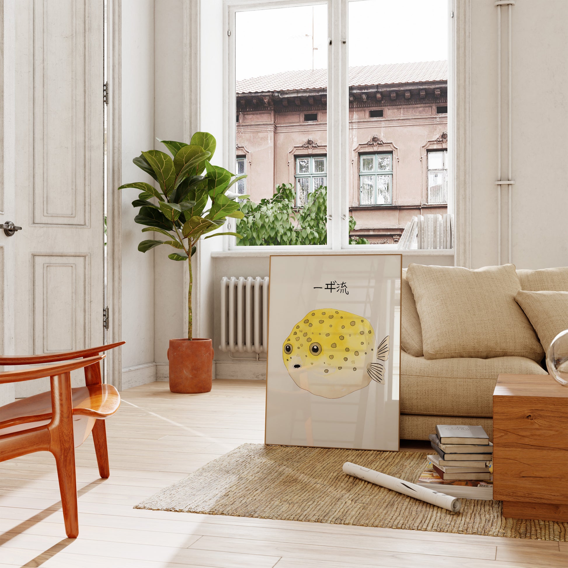 A cozy living room with a sofa, wooden table, potted plant, and artwork leaning against the wall.
