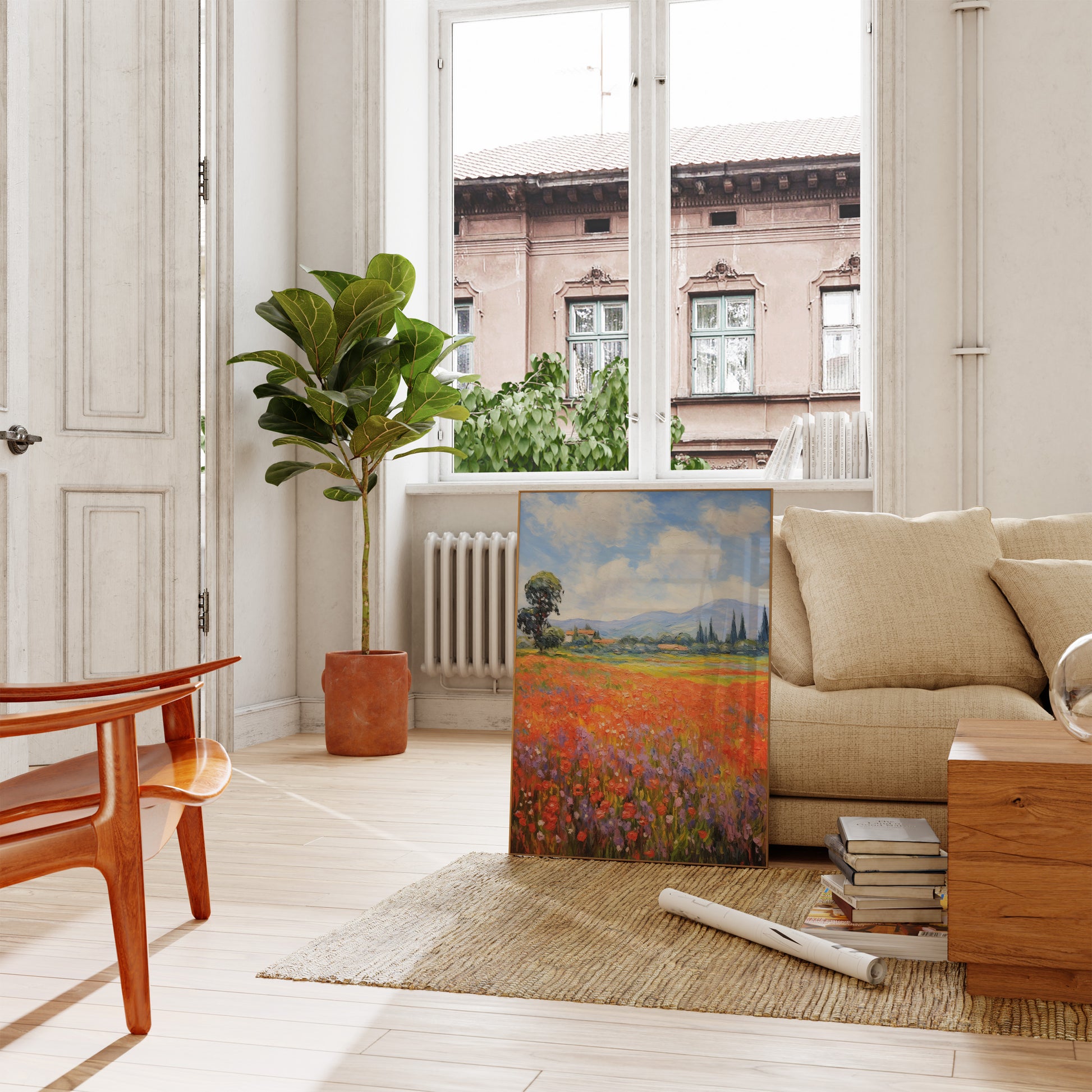A bright living room with a landscape painting, a sofa, and a large plant near an open window.
