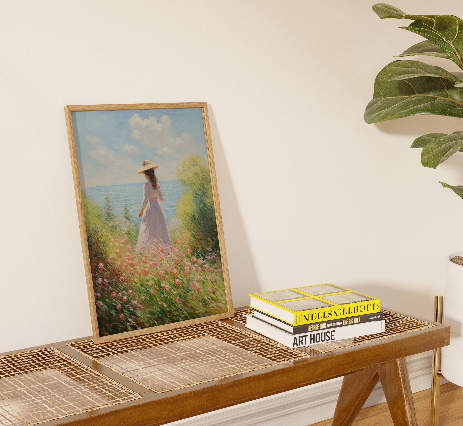 Portrait of a woman in a garden leaning on a parasol, showcased with books on a side table.