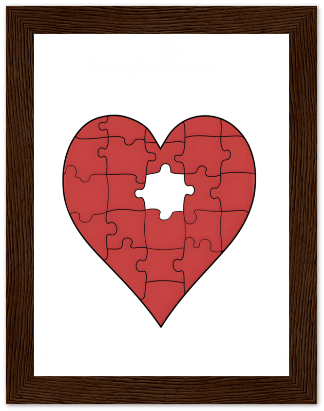 A framed puzzle in the shape of a red heart with one piece missing.