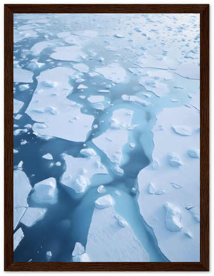 A framed image depicting floating ice on a serene blue sea.