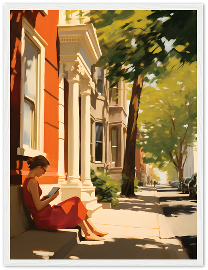 A person reading a book on a sunny city sidewalk.