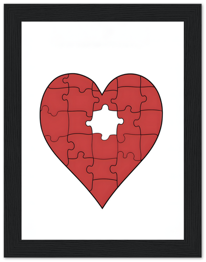 A framed puzzle of a red heart with one missing piece.