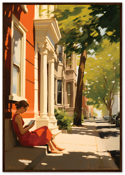 A person reading a book on a sunny city sidewalk.