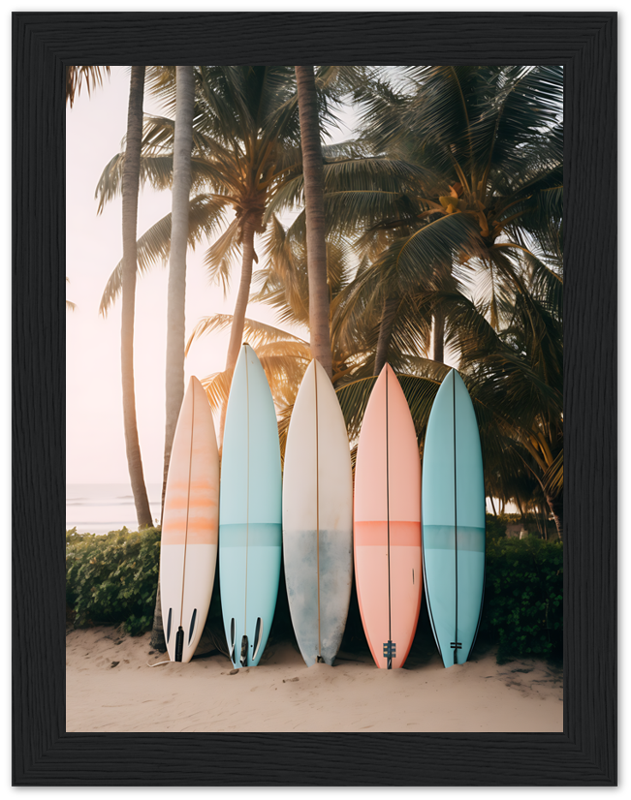 Five surfboards leaning against palm trees on a tropical beach at sunset.