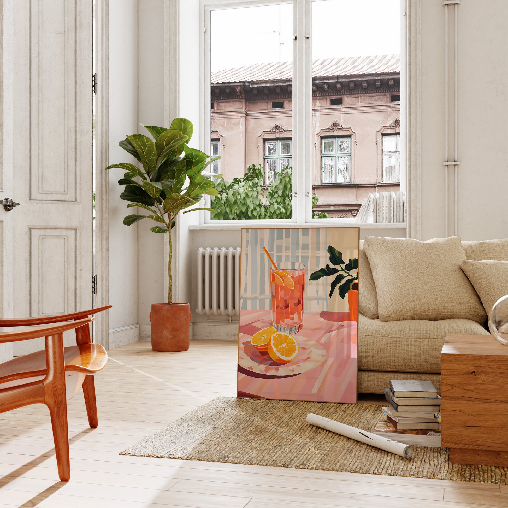 A bright living room with a plant, modern furniture, and a painting of oranges on a Plexiglas stand.