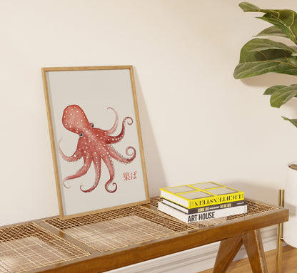 Framed octopus illustration on a shelf beside books.
