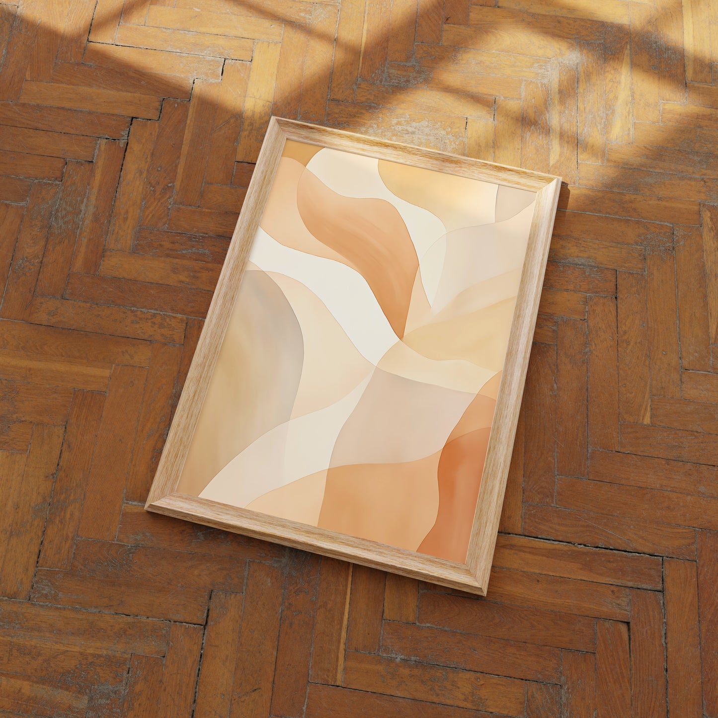 Abstract art in wooden frame on herringbone floor.