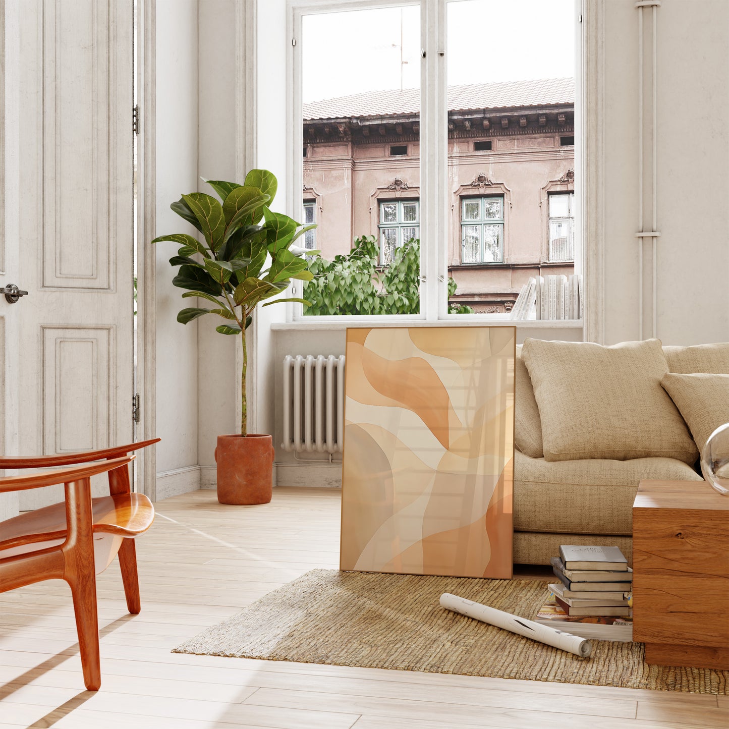 Alt text: A cozy living room with an open door, a sofa, modern art, and a green plant.