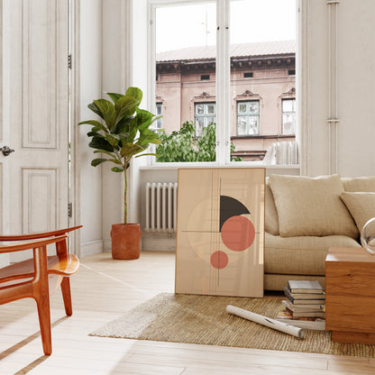 A cozy living room with modern furniture and a large plant by the window.