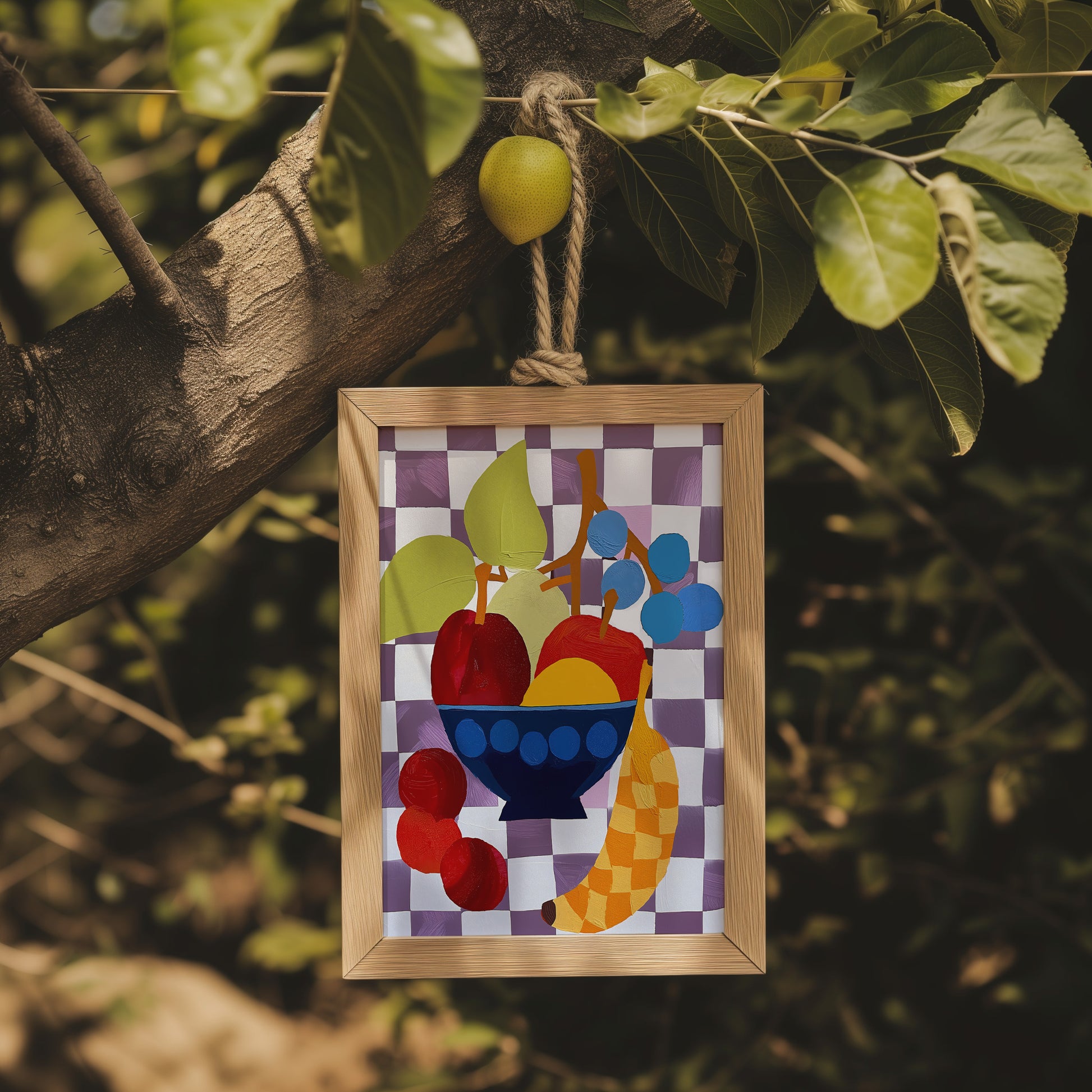 A colorful abstract artwork of fruit hanging on a tree branch.