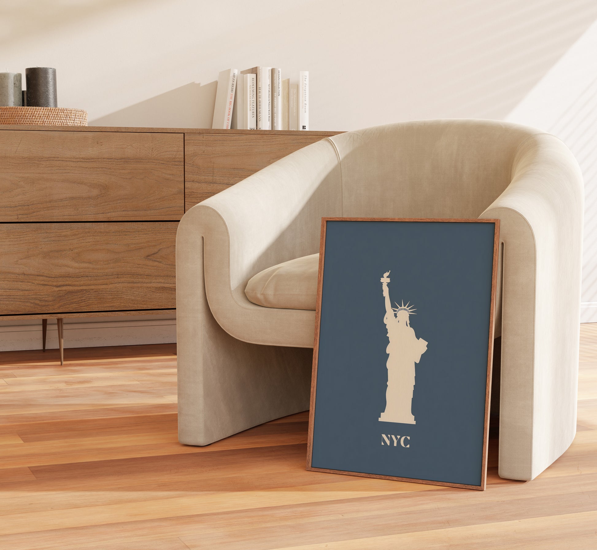 Modern chair and wooden cabinet with framed Statue of Liberty poster.