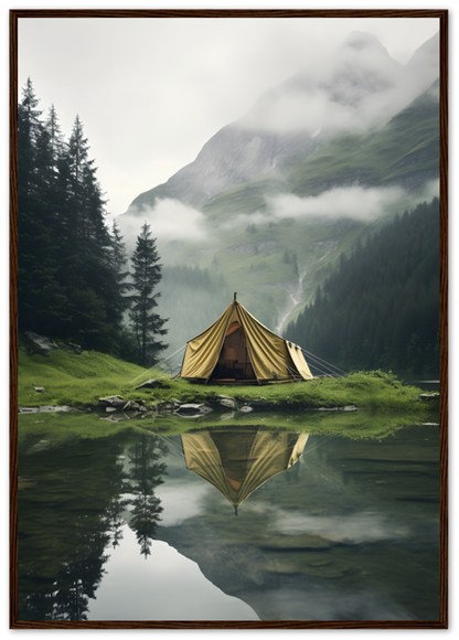 A canvas tent by a tranquil mountain lake with a reflection and misty hills in the background, framed by wood.