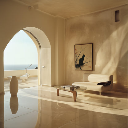 A sunny, modern living room with a white sofa, glass table, and ocean view through an arched doorway.