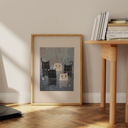 Illustrated poster of cats in a room, leaning against a wall next to a wooden table.