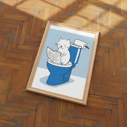 Illustration of a cat reading a book on the toilet, framed and hanging on a wooden floor.