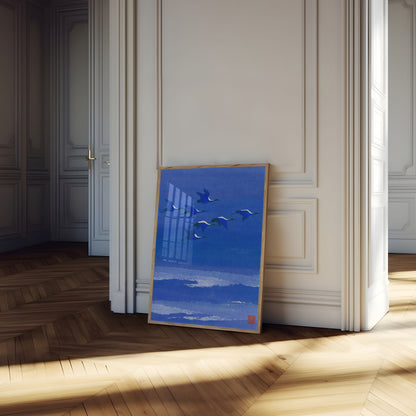 Flyvende traner over havet plakat