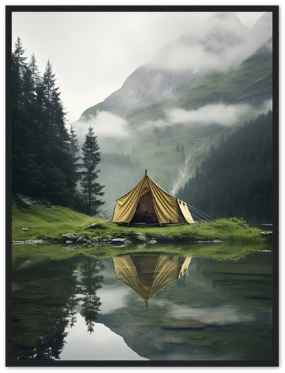 A tent reflected in a clear mountain lake surrounded by misty peaks.