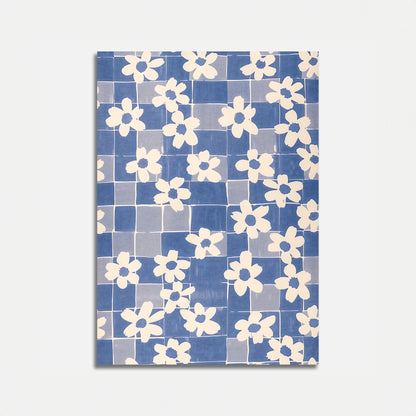 Blue and white floral pattern on a tiled background.