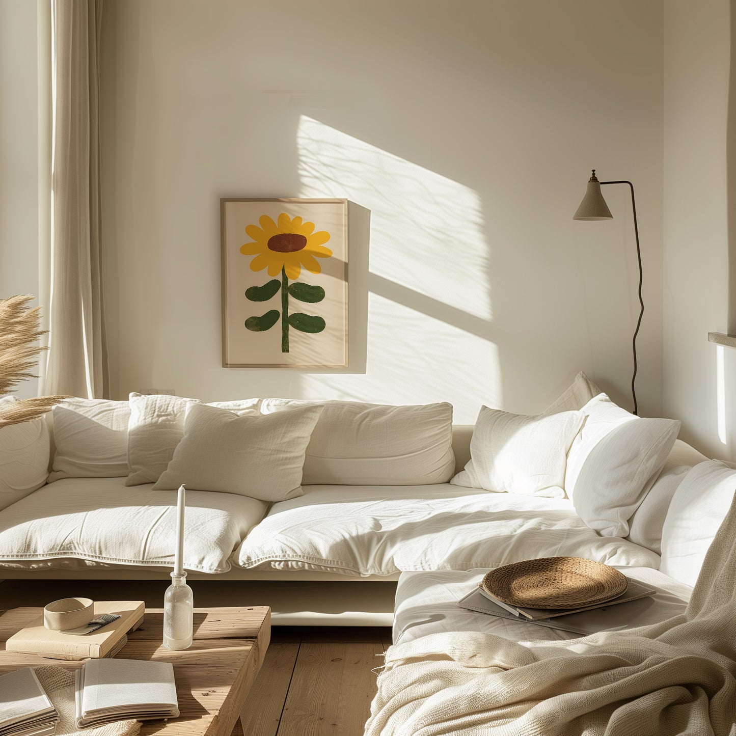 A cozy living room with a white sofa, sunflower painting, and soft sunlight.