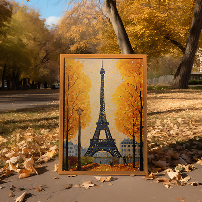 A painting of the Eiffel Tower in autumn displayed outdoors surrounded by fallen leaves.