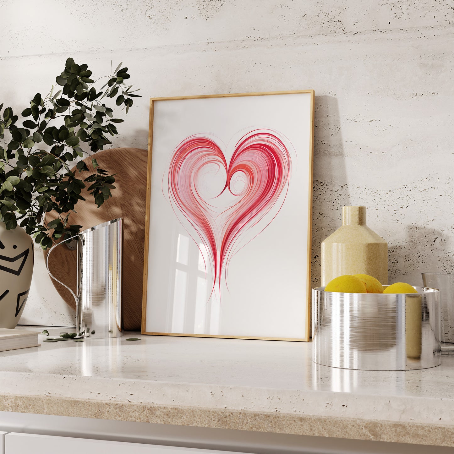 Modern heart-shaped artwork on a kitchen counter beside decorative items.