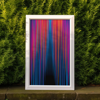 A vibrant vertical striped artwork in a white frame against a green hedge.