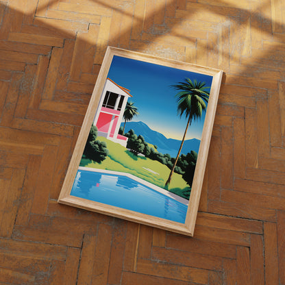 A vibrant framed poster of a tropical landscape on a wooden floor.