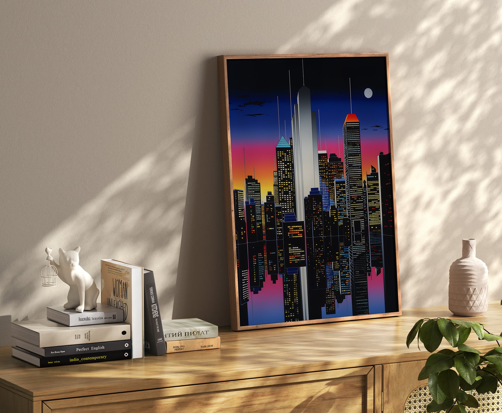 Canvas art of a cityscape at twilight on a shelf with books and decor.