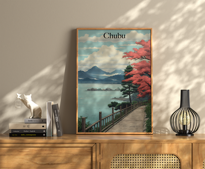 Vintage travel poster of Chubu, Japan on a wall above a sideboard with decor items.