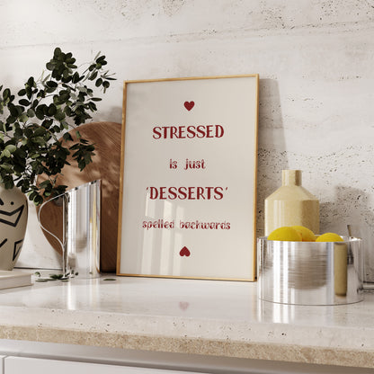 A framed quote on a kitchen countertop reads "stressed is just 'desserts' spelled backwards."