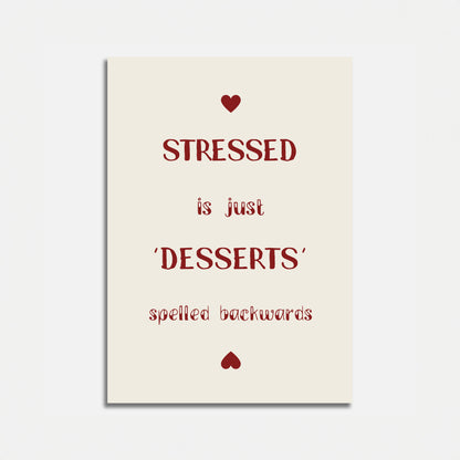 Decorative poster with text "STRESSED is just 'DESSERTS' spelled backwards" and heart designs.